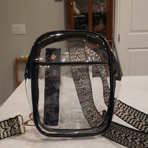 Clear PVC Sling Backpack with Black Trim and Patterned Strap